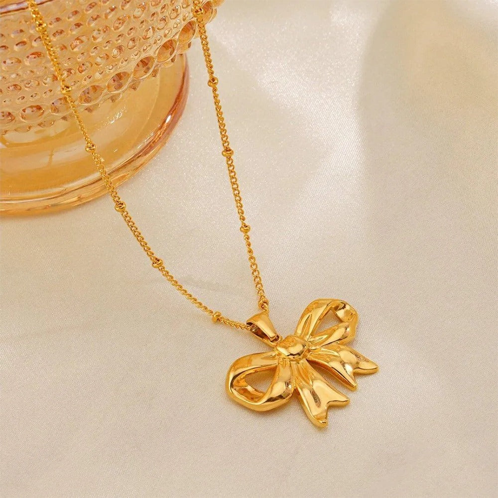 Bold Bow Charm Pendant