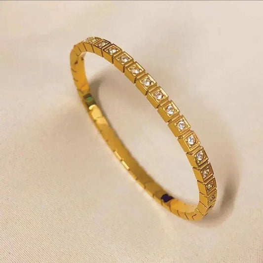 Golden whisper bangle